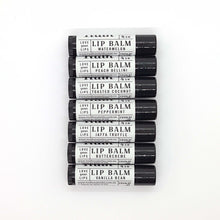 Load image into Gallery viewer, Truth Cosmetics vegan lip balm set of seven black tubes with watermelon peach coconut peppermint vanilla flavors