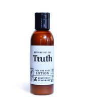 Load image into Gallery viewer, Truth Cosmetics vegan face and body lotion with grapefruit and cedarwood in amber bottle