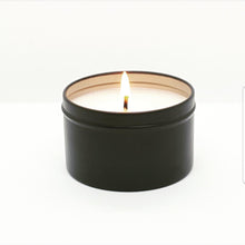 Load image into Gallery viewer, Truth Cosmetics1 grapefruit cedarwood lotion and candle pack lit black tin candle on white background
