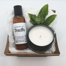 Load image into Gallery viewer, Truth Cosmetics grapefruit cedarwood lotion and candle pack featuring amber lotion bottle black tin candle and succulent