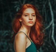Load image into Gallery viewer, Portrait of redheaded model in green tank top for Truth Cosmetics natural swimmers shampoo vegan hair care