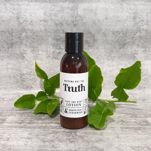 Truth Cosmetics vegan face and body lotion with grapefruit and cedarwood in brown bottle